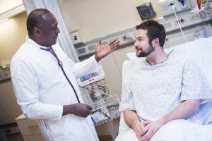 Doctor speaking with a patient