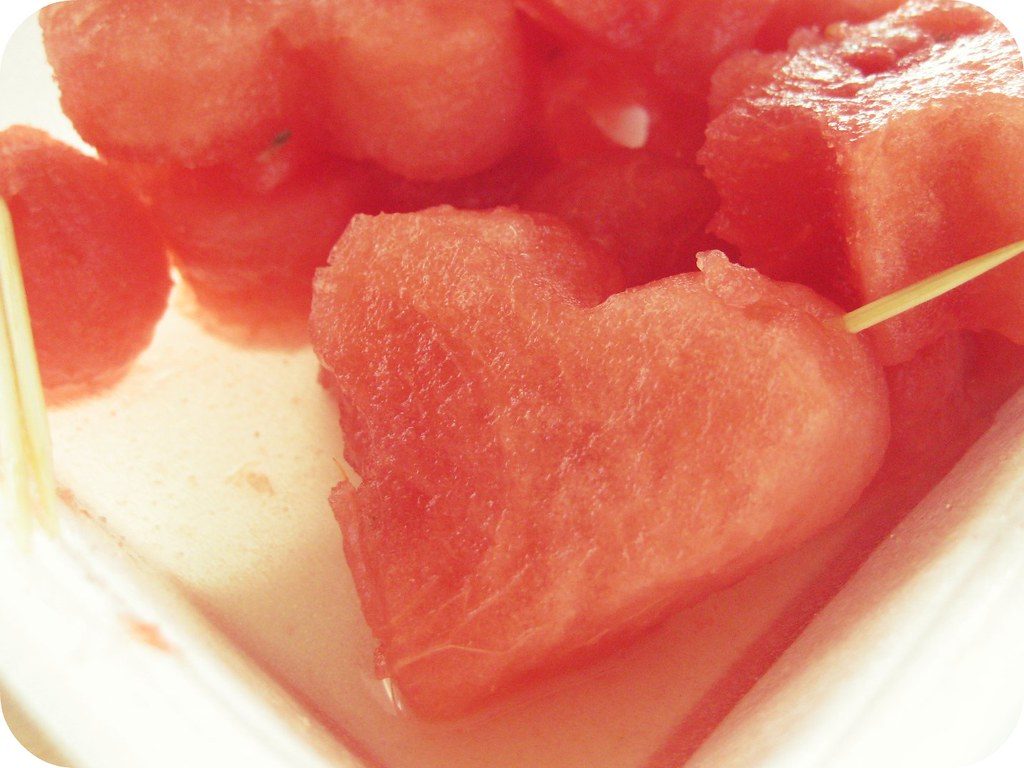 Watermelon cut in the shape of a heart.